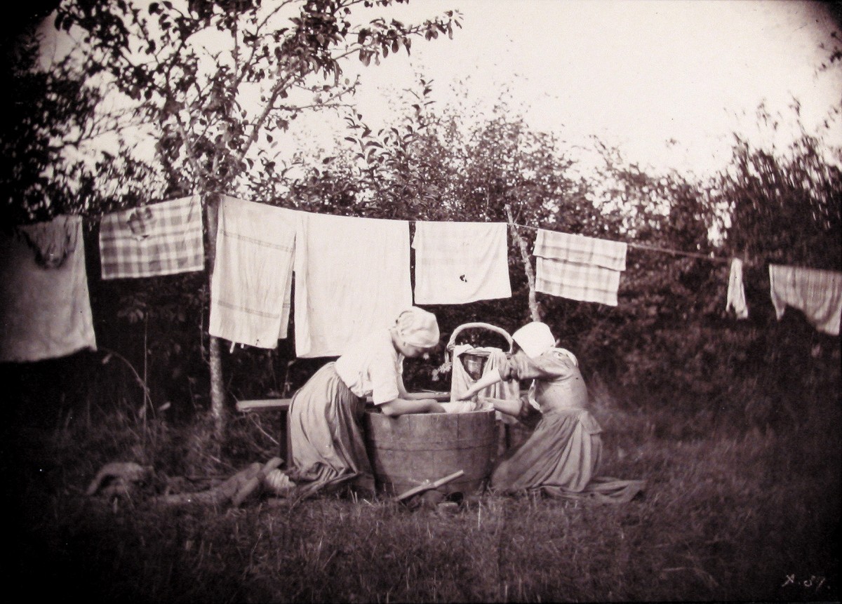 Two women doing laundry