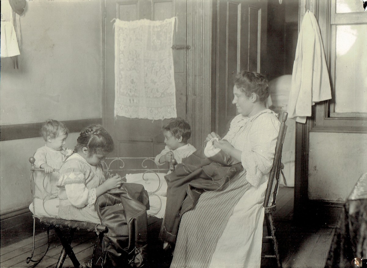 N.Y. tenement. Little ones helped in homework