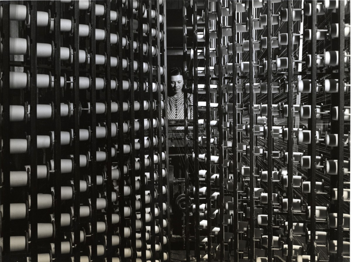 Worker at the Ponemah Mills, Taftville, CT. Makers of Rayon and Cotton.