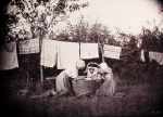 Two women doing laundry