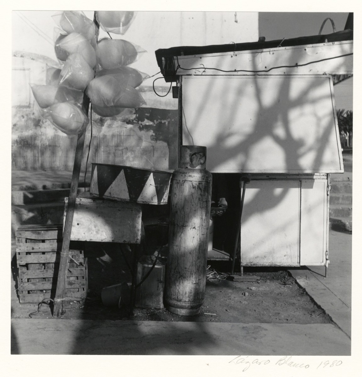Untitled (gas cylinder in market)